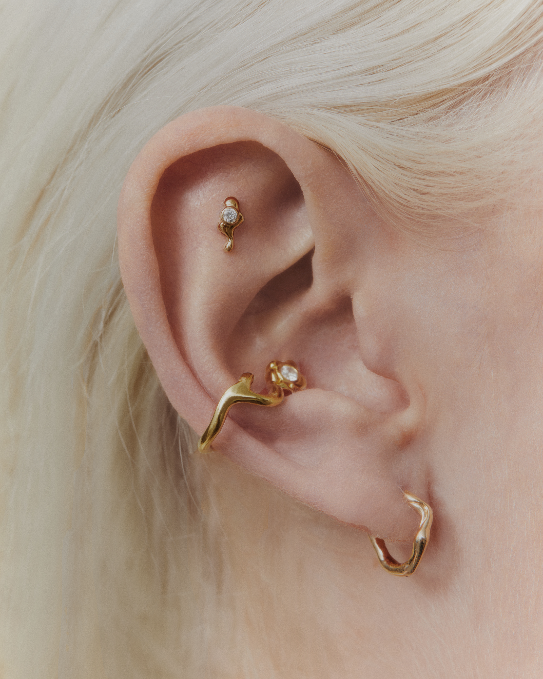 Maria Black Rainbow Huggie earring - Metallic